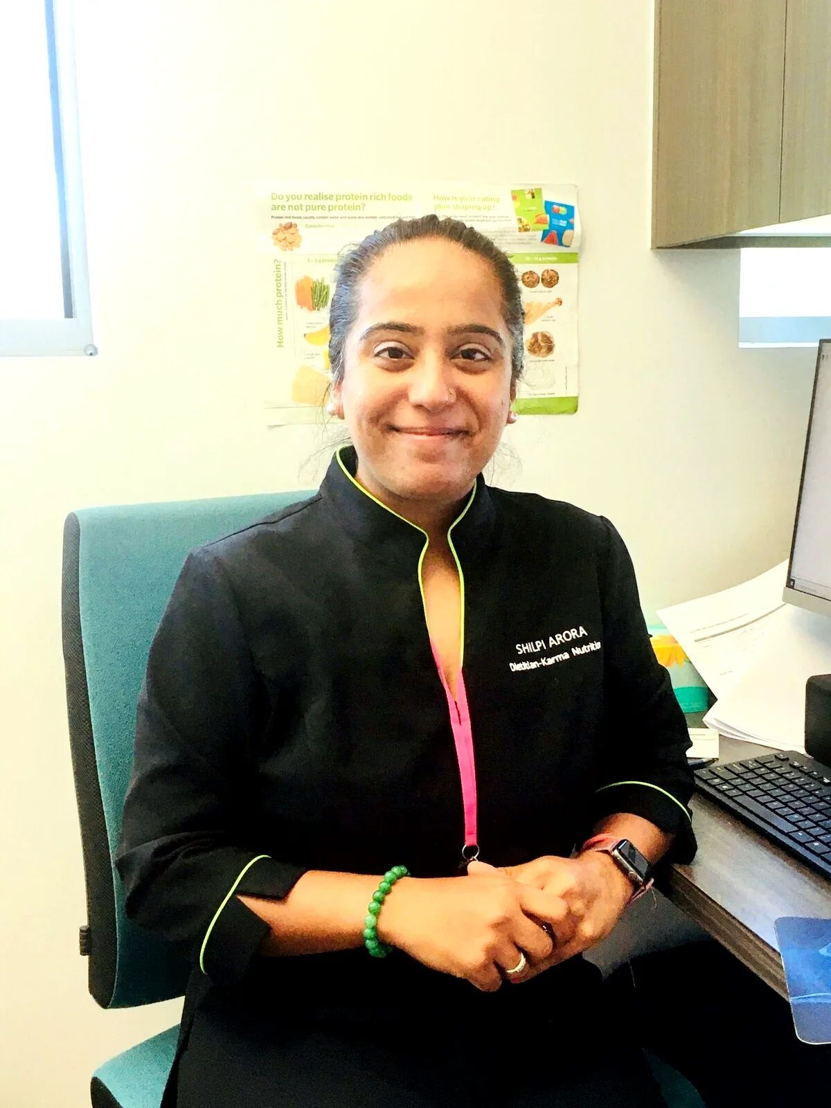 Shilpi Arora at her desk at SmartClinics Arundel